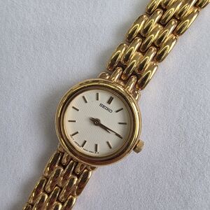 Seiko Gold and White Women's Watch